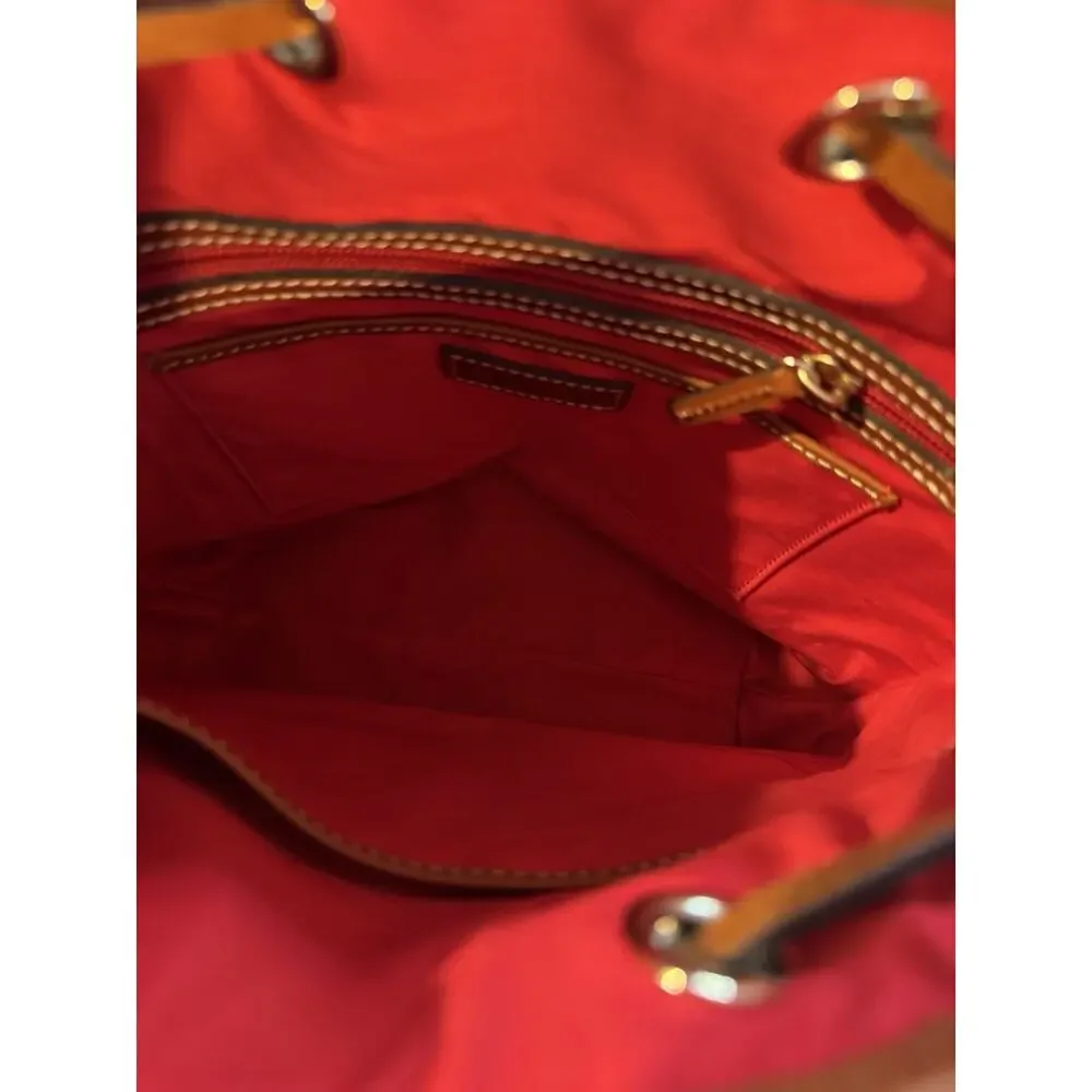 Dooney & Bourke Pebble Grain Drawstring Bucket Bag Blue Leather Red Interior